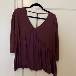 three quarter length sleeve plum top. size small